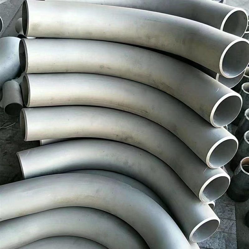 Stainless steel 3D pipe bends after pickling, ready for inspection